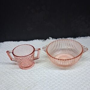 Pink Depression glass bowl and sugar bowl